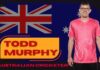 Todd Murphy: Age, Height, Family, Career, Stats, Net Worth & More Todd Murphy Australian cricketer portrait with Australia flag background wearing glasses and pink jersey